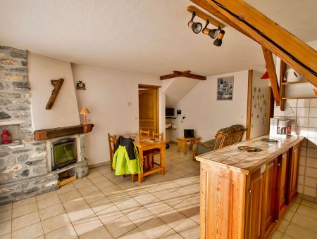 La salle à manger et coin cuisine de la Pointe du Jour, appartement 8837 pour 4 personnes